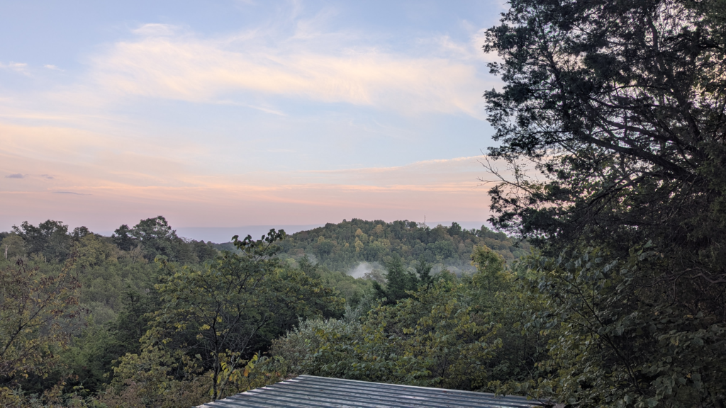 view from deck at sunset after rain